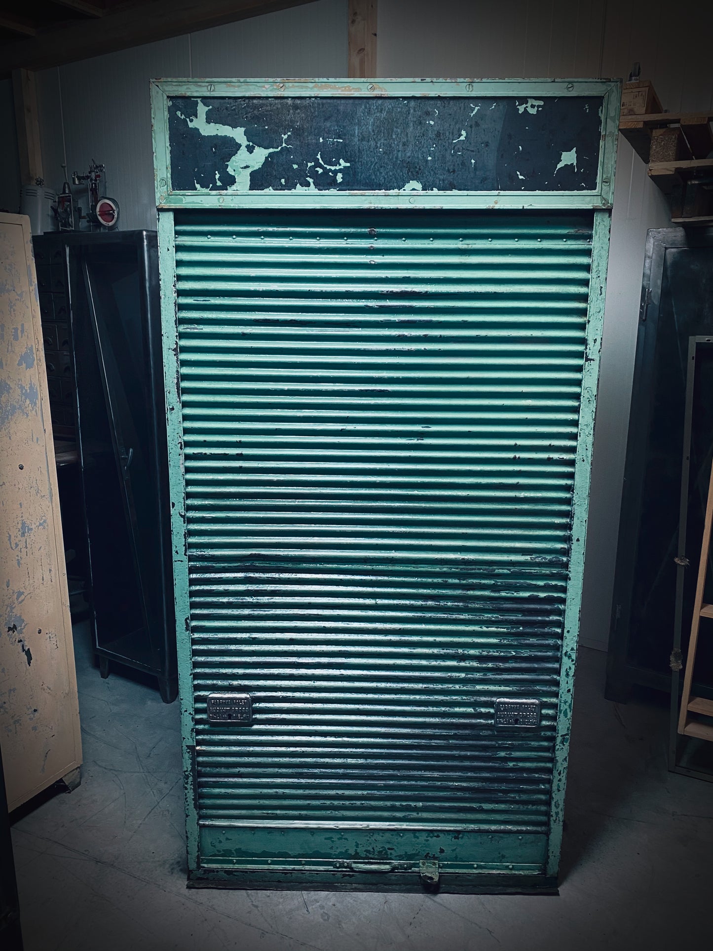 Rolling door closet with bank of drawers