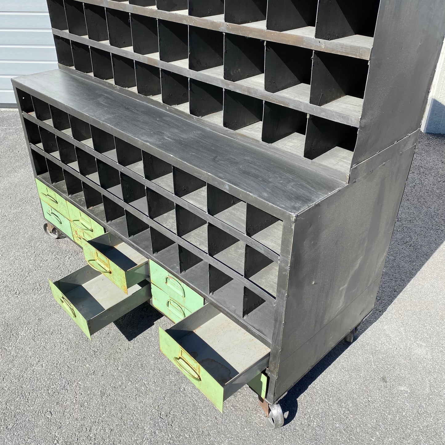 Heavy duty pigeon-hole metal shelving rack