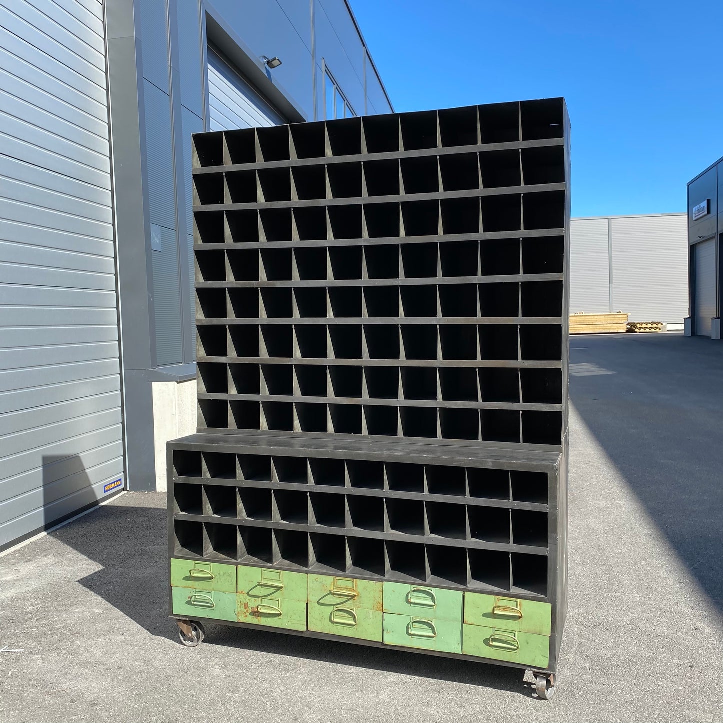 Heavy duty pigeon-hole metal shelving rack