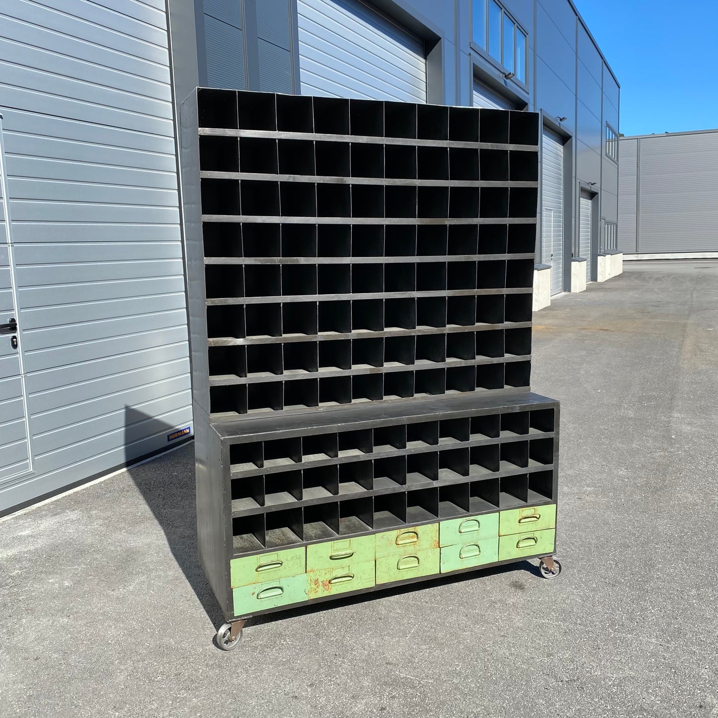 Heavy duty pigeon-hole metal shelving rack