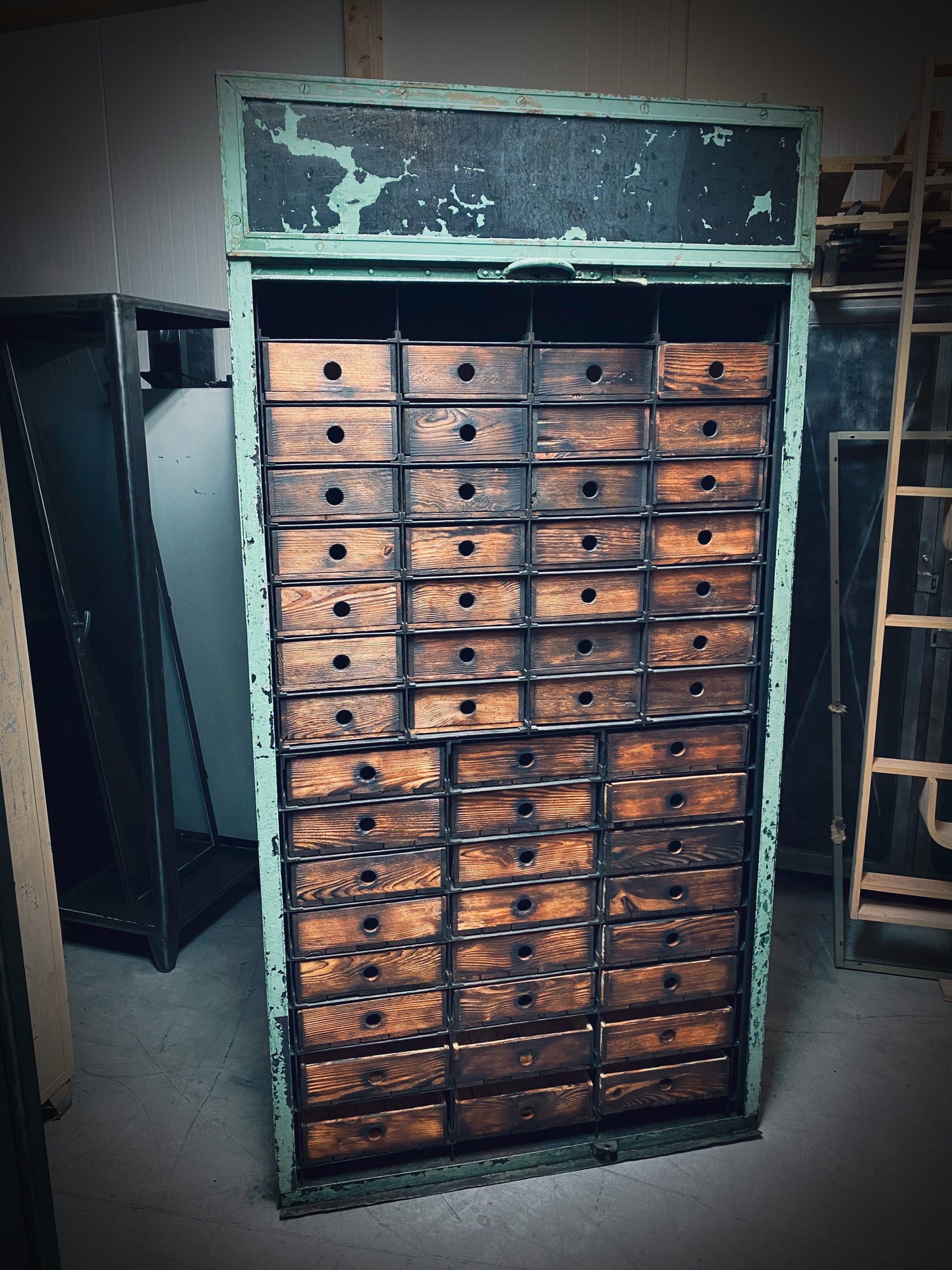 Rolling door closet with bank of drawers