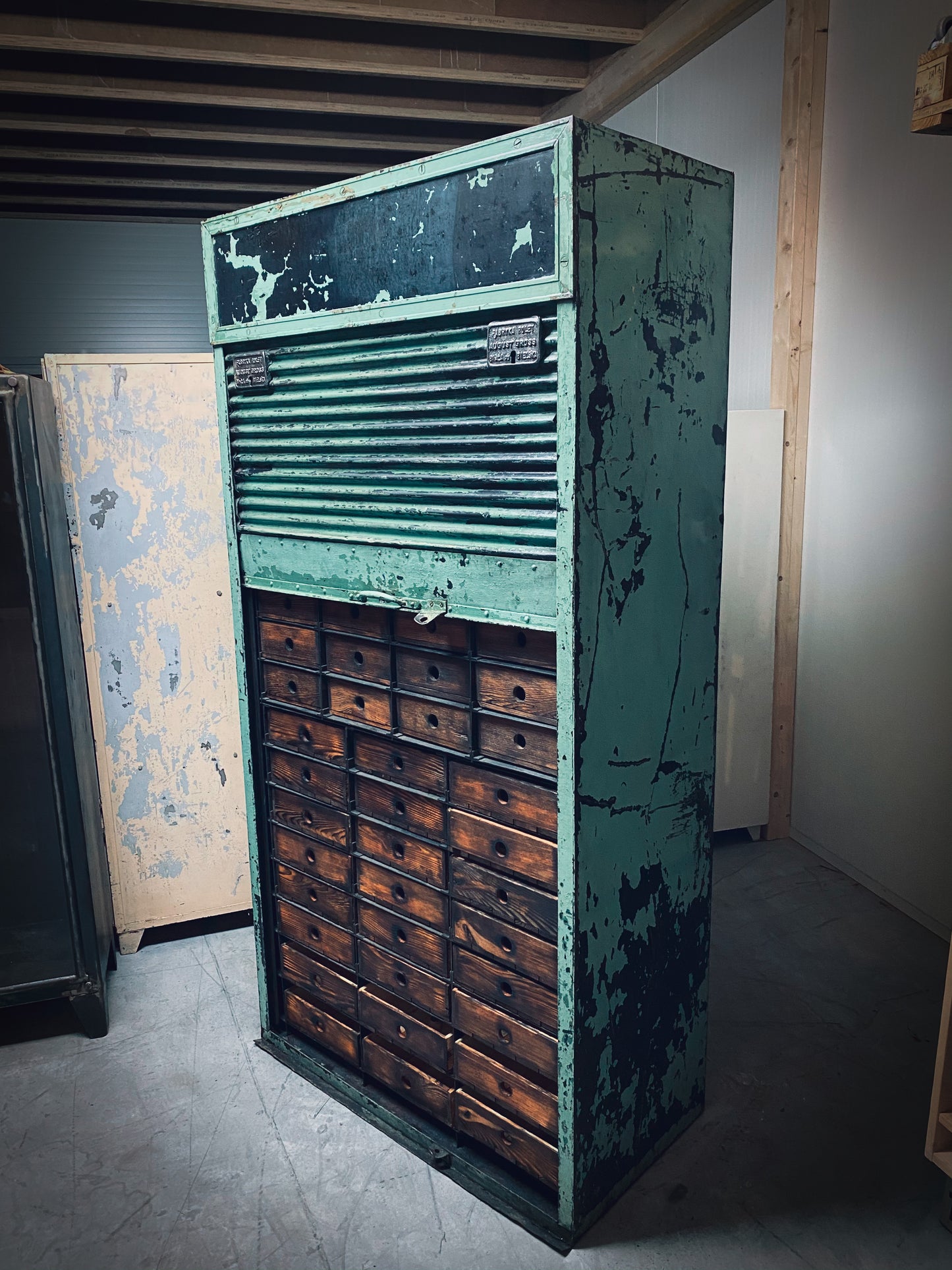Rolling door closet with bank of drawers