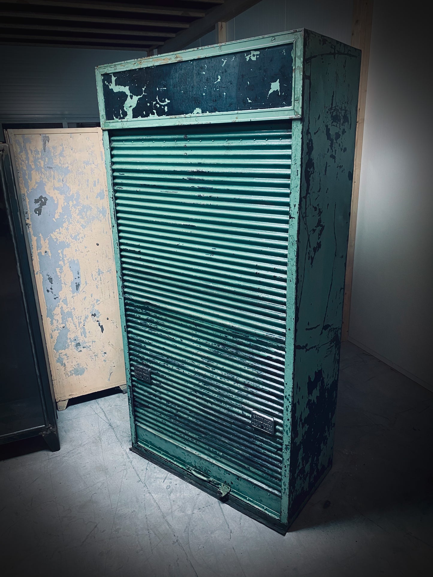Rolling door closet with bank of drawers