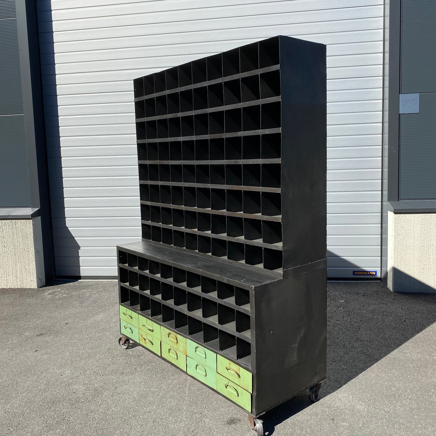 Heavy duty pigeon-hole metal shelving rack