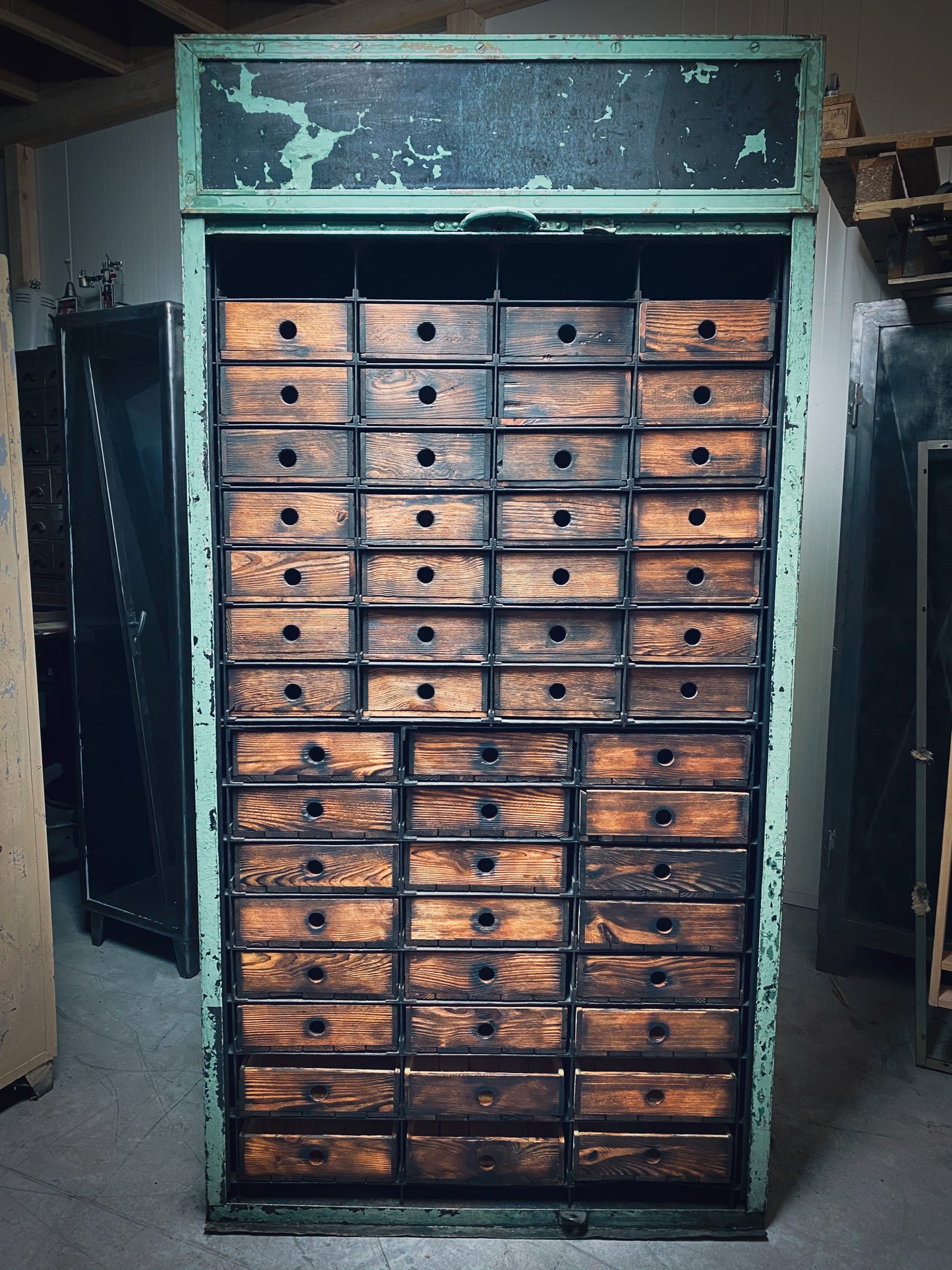 Rolling door closet with bank of drawers