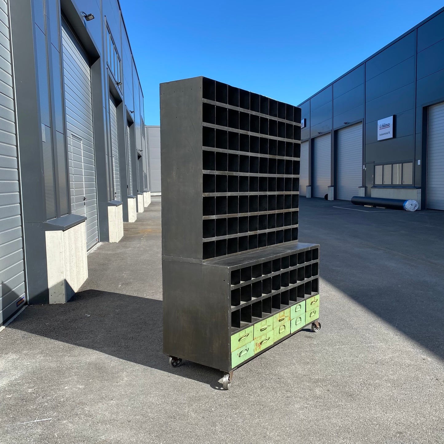 Heavy duty pigeon-hole metal shelving rack