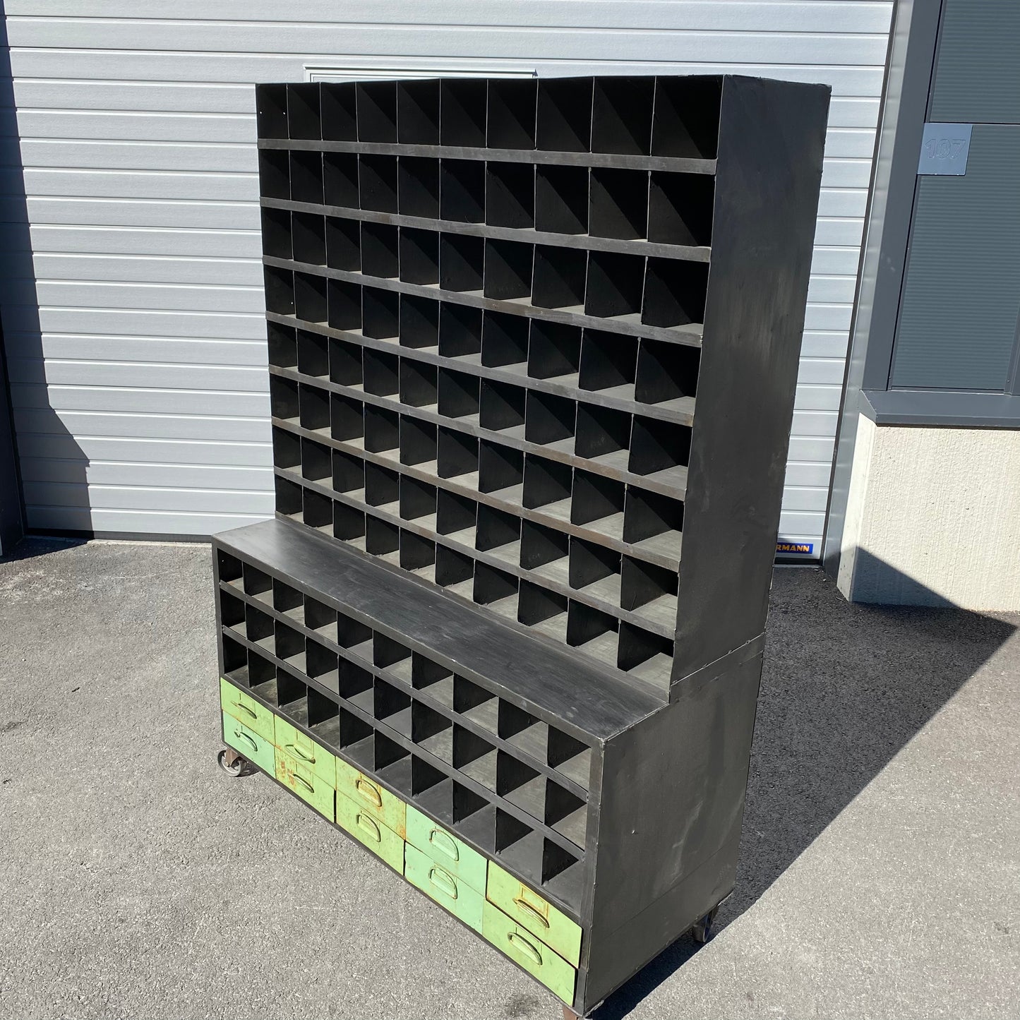Heavy duty pigeon-hole metal shelving rack