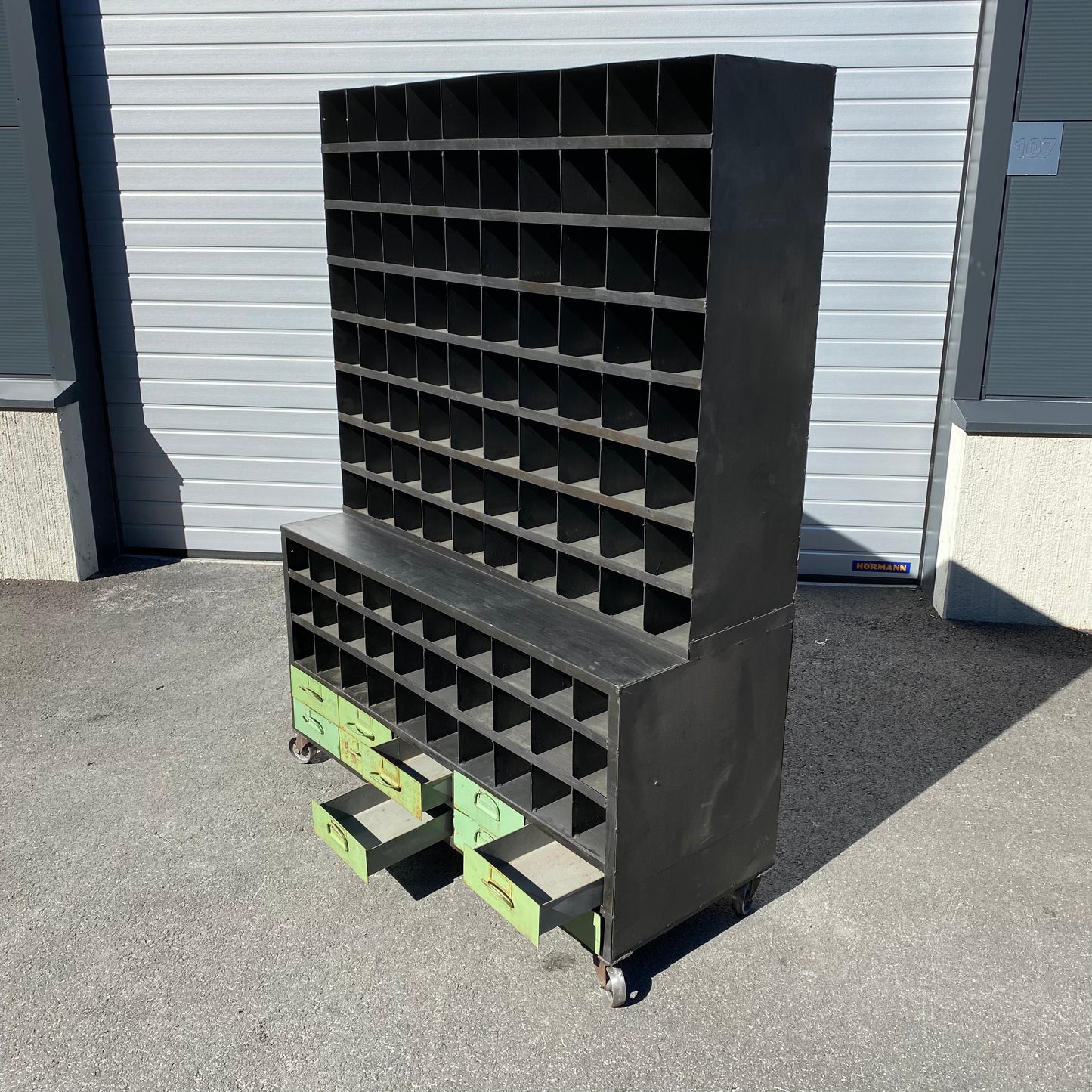 Heavy duty pigeon-hole metal shelving rack