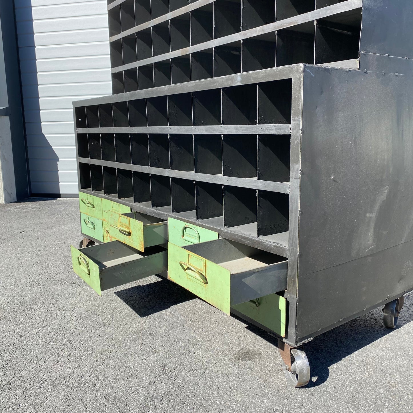 Heavy duty pigeon-hole metal shelving rack