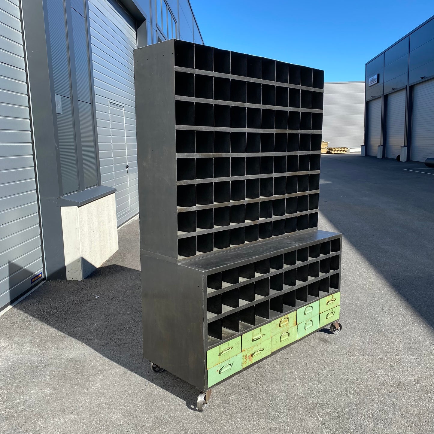 Heavy duty pigeon-hole metal shelving rack