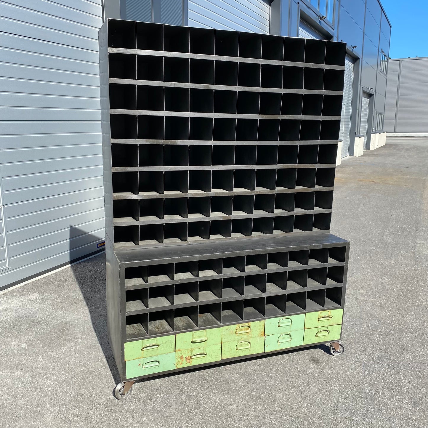 Heavy duty pigeon-hole metal shelving rack