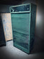 Rolling door closet with bank of drawers