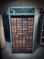 Rolling door closet with bank of drawers