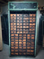 Rolling door closet with bank of drawers