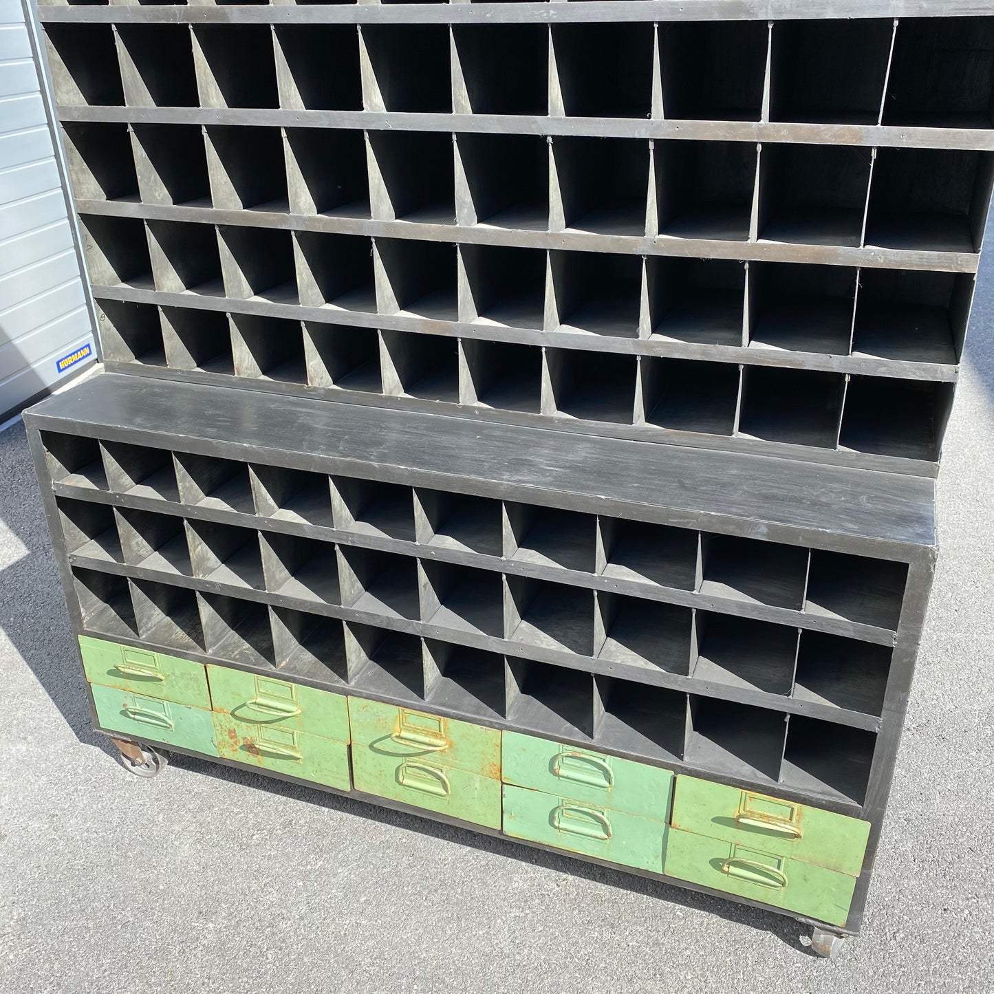 Heavy duty pigeon-hole metal shelving rack